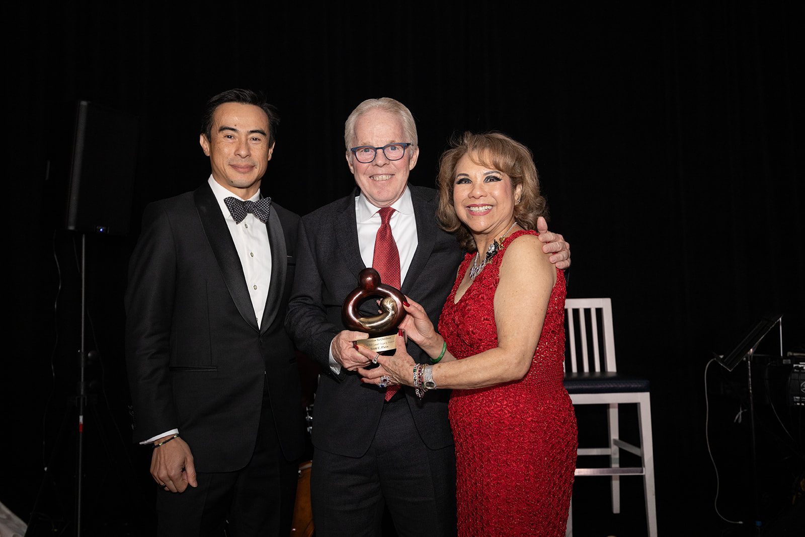 A William H. Lauer Legacy Award presentation at a past Gala